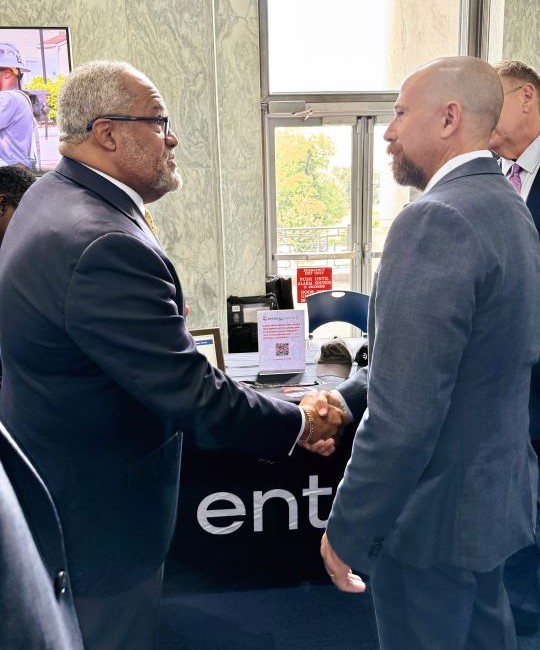 U.S. Rep. Troy Carter, D-La., with a member of Entergy's Incident Response team.